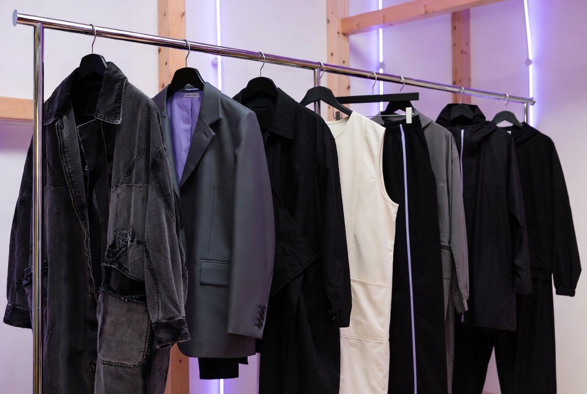 Soft Law · Hard Rain — wave 1 line on chrome rails in the Living Atelier